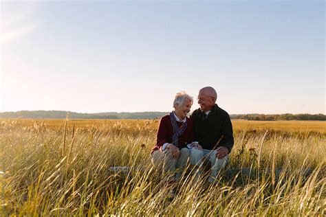 Happy Senior Couple Modern Love Laughing Together On Autumn Walk By