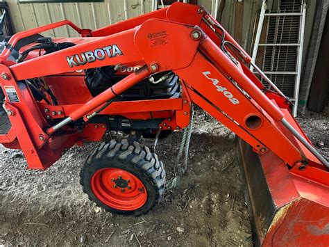 Kubota B7800 Tractor With Kubota La402 And Digger Attachments And