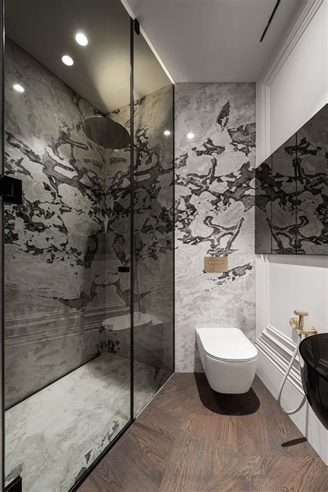 A Modern Bathroom With Marble Walls And Flooring