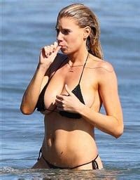 Charlotte Mckinney S Tiny Bikini Struggles To Contain Her Boobs