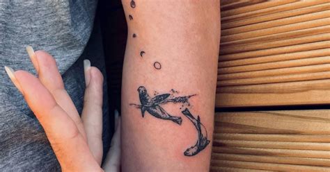 Sea Lions And Moon Phases Tattoo Hand Poked On The Arm