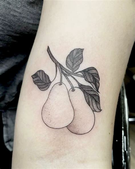 Two Pears With Leaves On The Arm