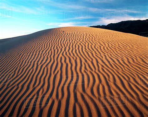 USA, California, Death Valley National Park, Mojave Desert, View of sand dunes at sunset - Stock ...