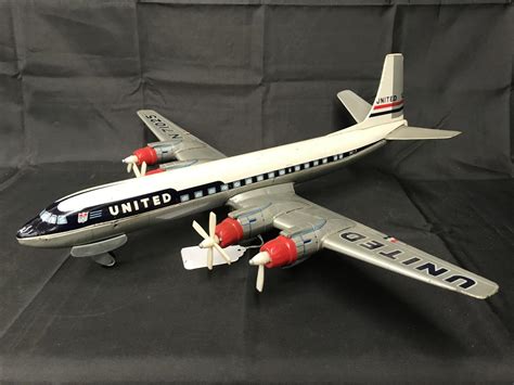 Tin Litho Cragstan United Airlines DC-7 Toy Plane