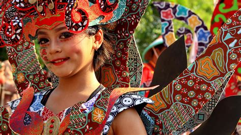 Beautiful women participate by wearing unique costumes at the ...