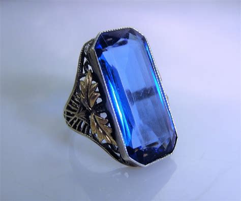 Edwardian Sterling Silver Ring That Has A Blue Sapphire Glass Stone