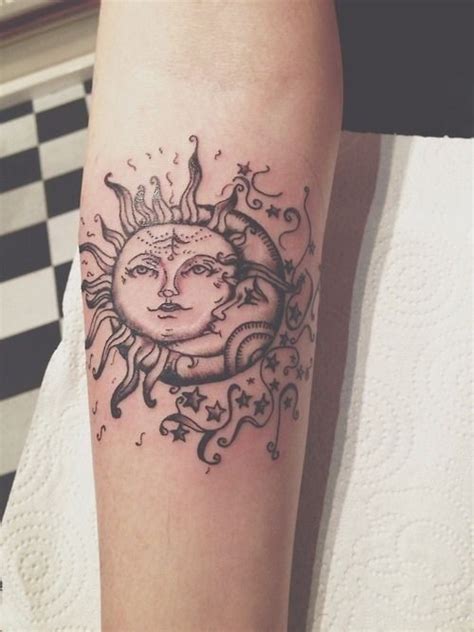 Old school sun with moon forearm tattoo - Tattooimages.biz