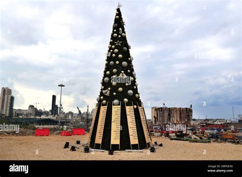 A Christmas Tree Decorated With Names Of Those Who Died In The August