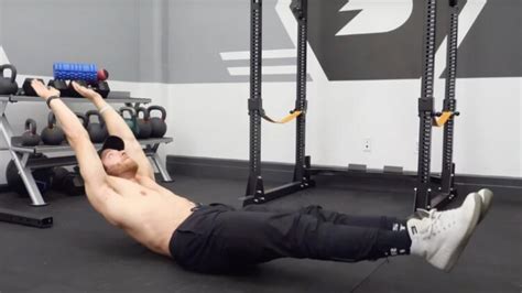 How to Do the Hollow Hold Position for Six-Pack Abs and Stronger Lifts | BarBend