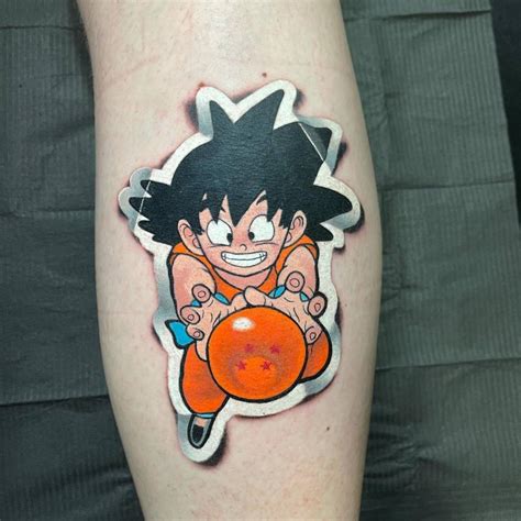 Goku Sticker Tattoo Located On The Calf Cartoon Style