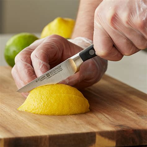 Wusthof Classic Forged Serrated Paring Knife With Pom Handle