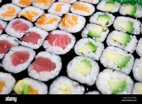 Maki Sushi Made From Avocados Salmon And Tuna Full Frame Stock Photo