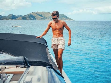 Daniel Ricciardo Puts Topless George Russell To Good Use In Bizarre