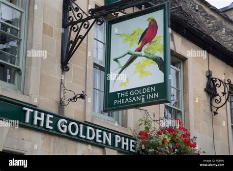 Golden Pheasant Inn Pub Sign Burford England Uk Stock Photo Alamy