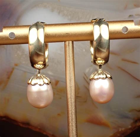 Lot Pair Of Pearl And Fourteen Karat Gold Earrings