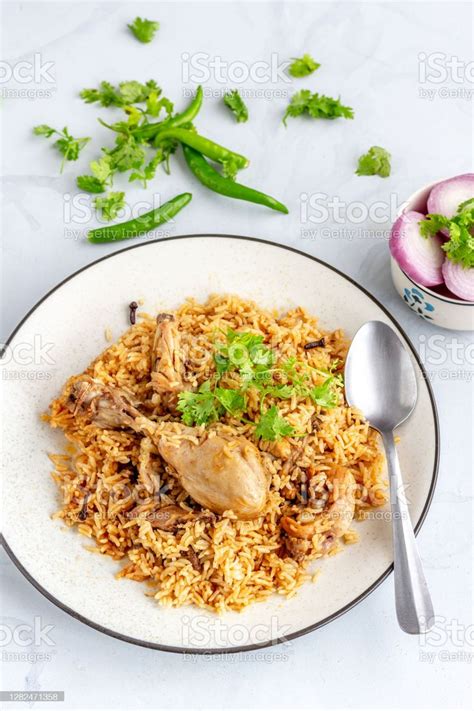 One Pot Indian Chicken And Rice Dish Directly Above Vertical Photo