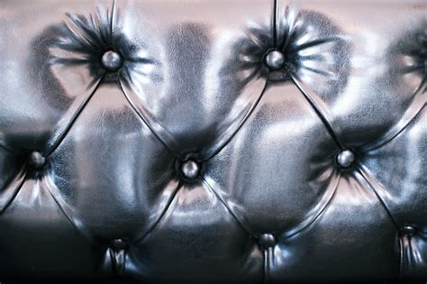 Premium Photo | Black leather sofa texture background.