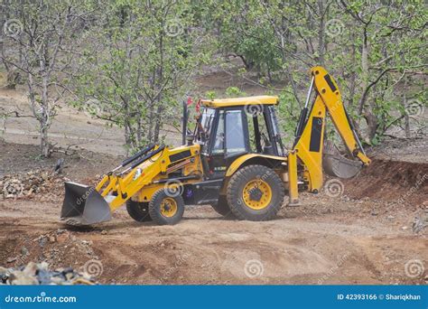 Excavator Loader Backhoe Digger At Road Construction Site Stock Photo