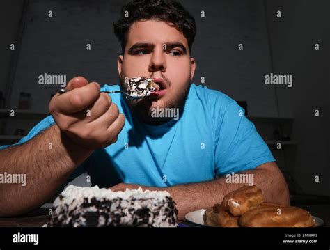 Obese Man Eating Cake Hi Res Stock Photography And Images Alamy