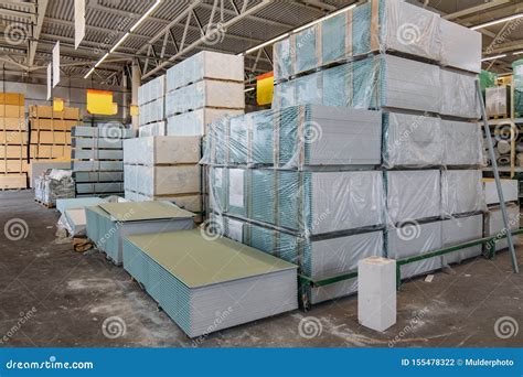 Building and Construction Materials in Warehouse Stock Photo - Image of board, manufacture ...