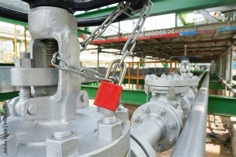 Red Key Lock And Chain To Prevent The Valve Being Opened Is Part Of The