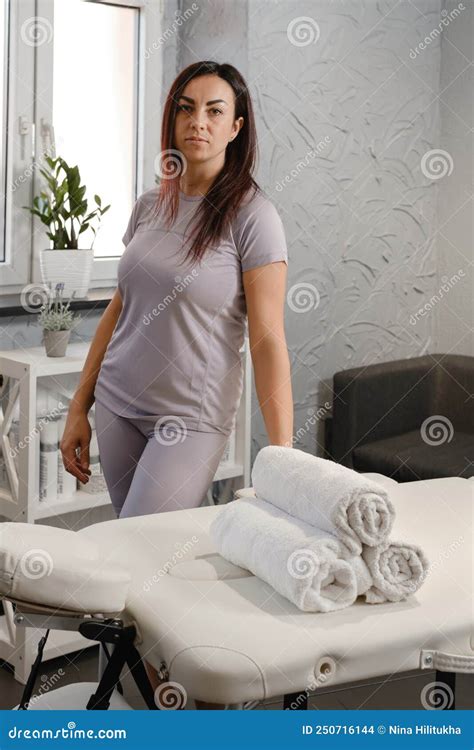 Therapist Preparing For Massage In Medical Office Stock Photo Image