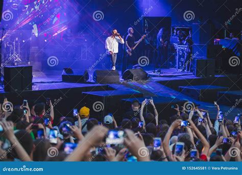 LVIV, UKRAINE - June 18, 2019: Rock Band Singer On Stage With ...