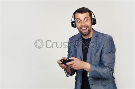 A Gay Male Gamer Playing A Video Game Annoyed And Stock Photo Crushpixel