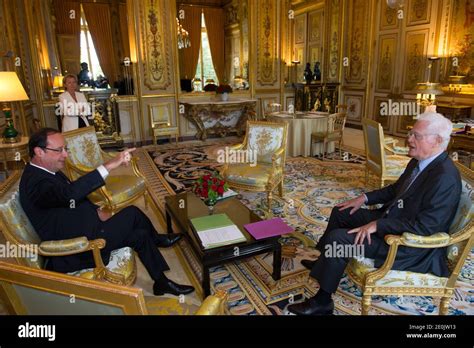 French President Francois Hollande And French Former Prime Minister