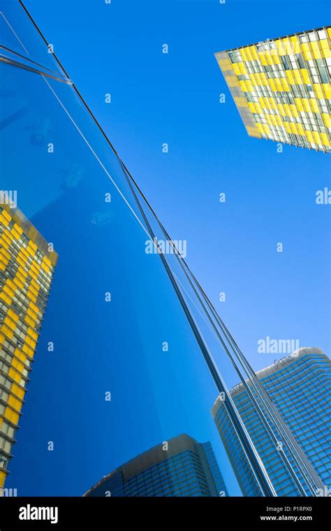 Colourful Buildings And Blue Sky Reflected In A Glass Building Facade Las Vegas Nevada United