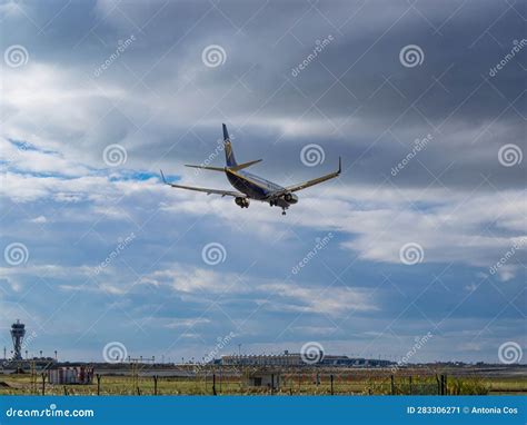 Plane Landing On The Runway Of Barcelona Airport Editorial Photo