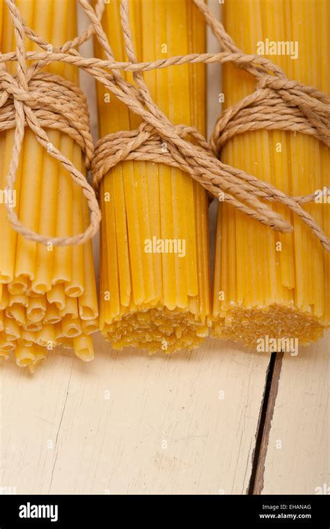 Bunch Of Italian Pasta Type On A White Rustic Table Stock Photo Alamy