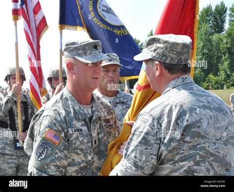 Lt Col Rob Larkin Receives The Colors From Maj Gen Edward W Tonini