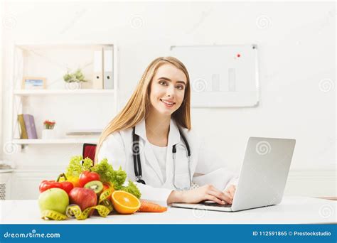 Female Nutritionist Working On Laptop Stock Image Image Of Dietitian