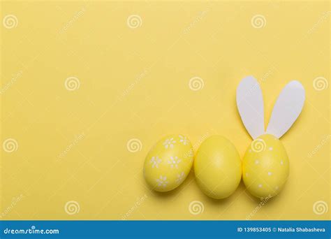 Yellow Easter Eggs on Yellow Background with Space. Concept Stock Image ...