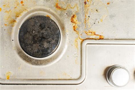 Estufa De Gas Sucia El Concepto De Limpieza En La Cocina Foto Premium