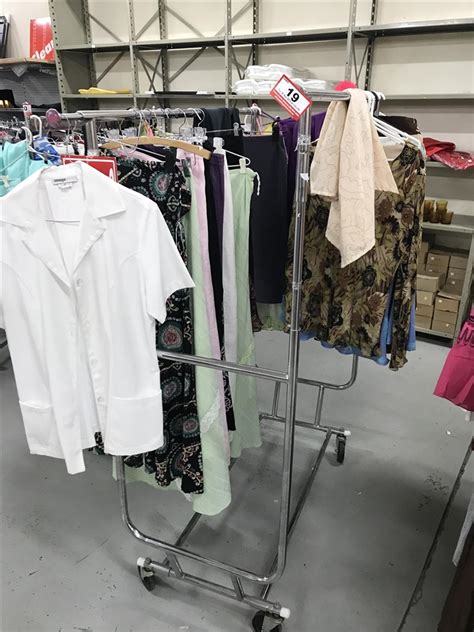 Clothes Rack With Assorted Clothes