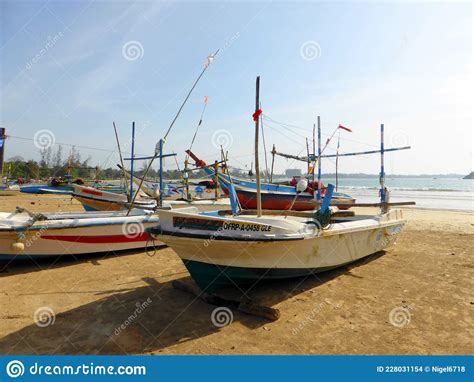 Several Traditional Filipino Outrigger Boats Or Banca Moored At A