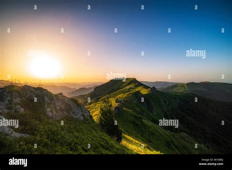 Beautiful clear sky summer sunset in the mountains. Landscape with sun ...