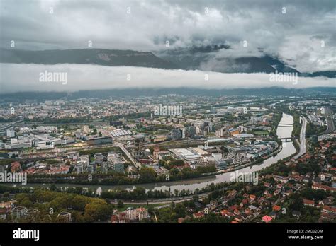 Grenoble Cityscape Aerial View Of Grenoble City With Clouds And