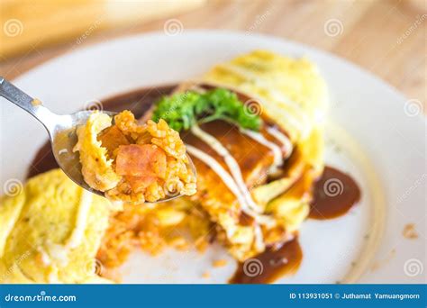 Omelette Rice Omurice In Spoon With White Dish Japanese Food Stock