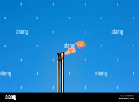 Burning Gas Flare In Oil Refinery Stock Photo - Alamy