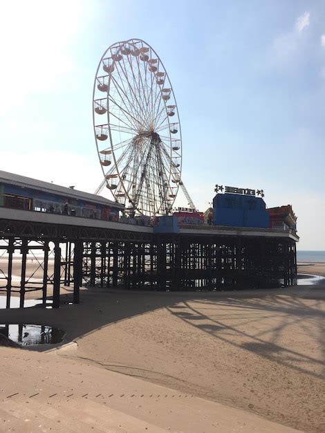 Premium Photo Ferris Wheel On Beach