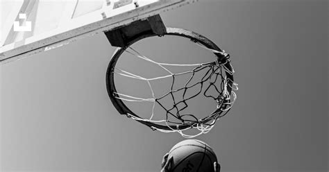 man dunking  basketball photo  human image  unsplash