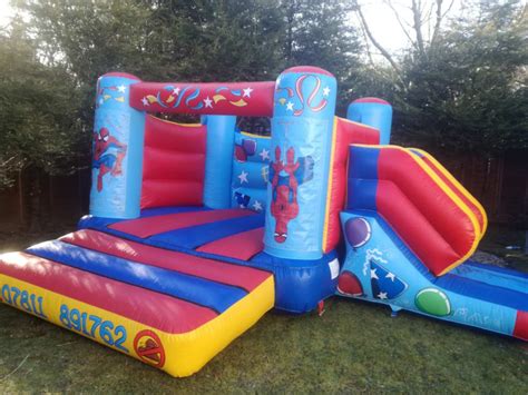 Spiderman Castle With Slide Acm Entertainments Bouncy Castle Hire