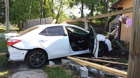 Car Crashes Through Fence On Westside