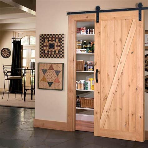 Esteban Rustic Unfinished 2 Panel V Groove Knotty Alder Barn Door F