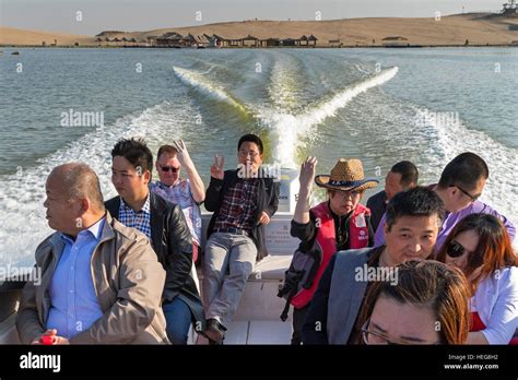 Speedboat And Passengers Sand Lake Shizuishan Ningxia China Stock