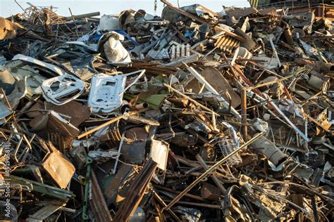 Foto De Metal Scrap Background Heap Of Scrap Metal Stored For