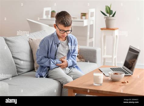 Little boy with dairy allergy at home Stock Photo - Alamy